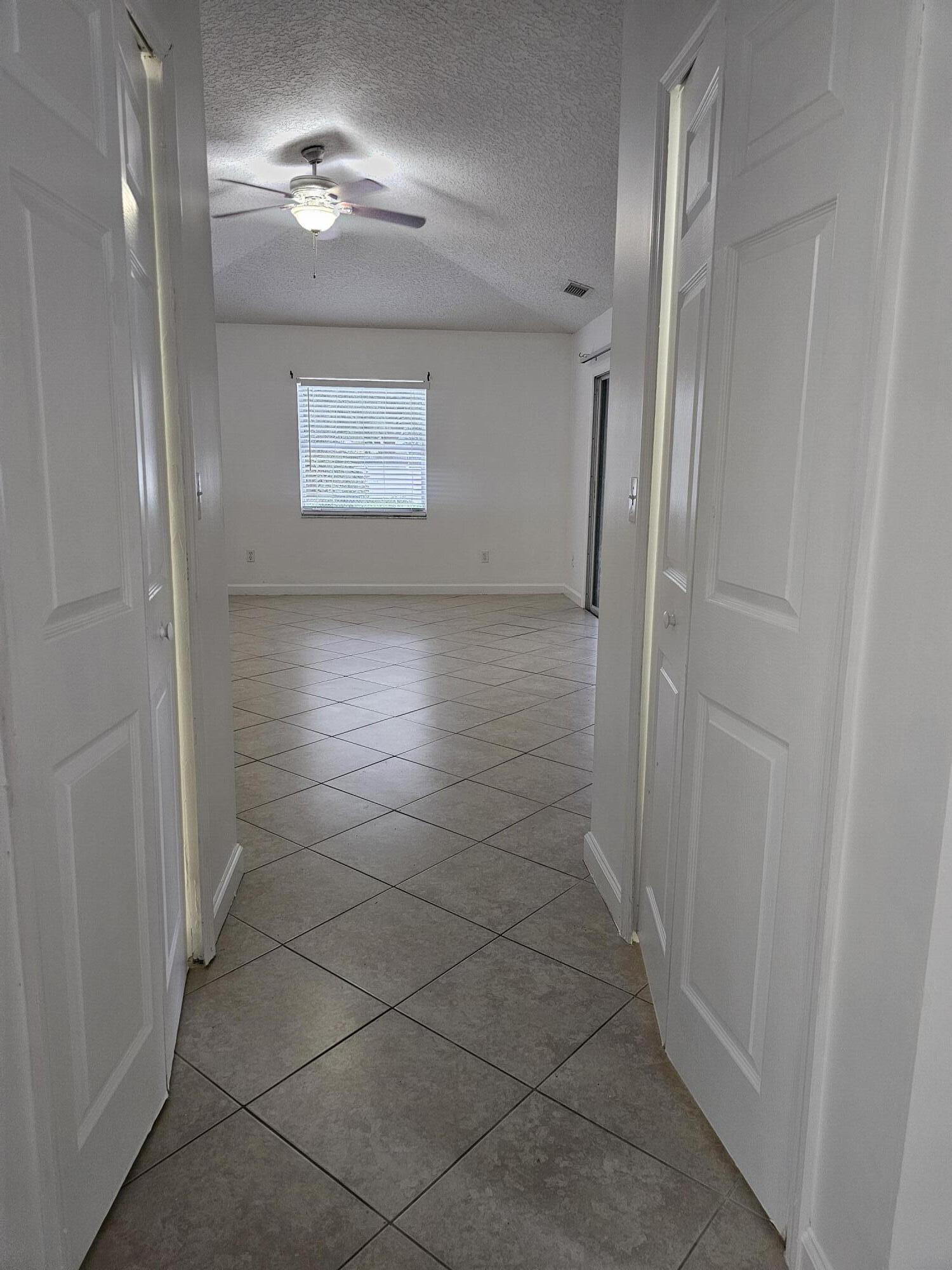 3215 Southeast Pinto Street Port St. Lucie, FL 34984 - Photo 13 of 34 a view of a hallway