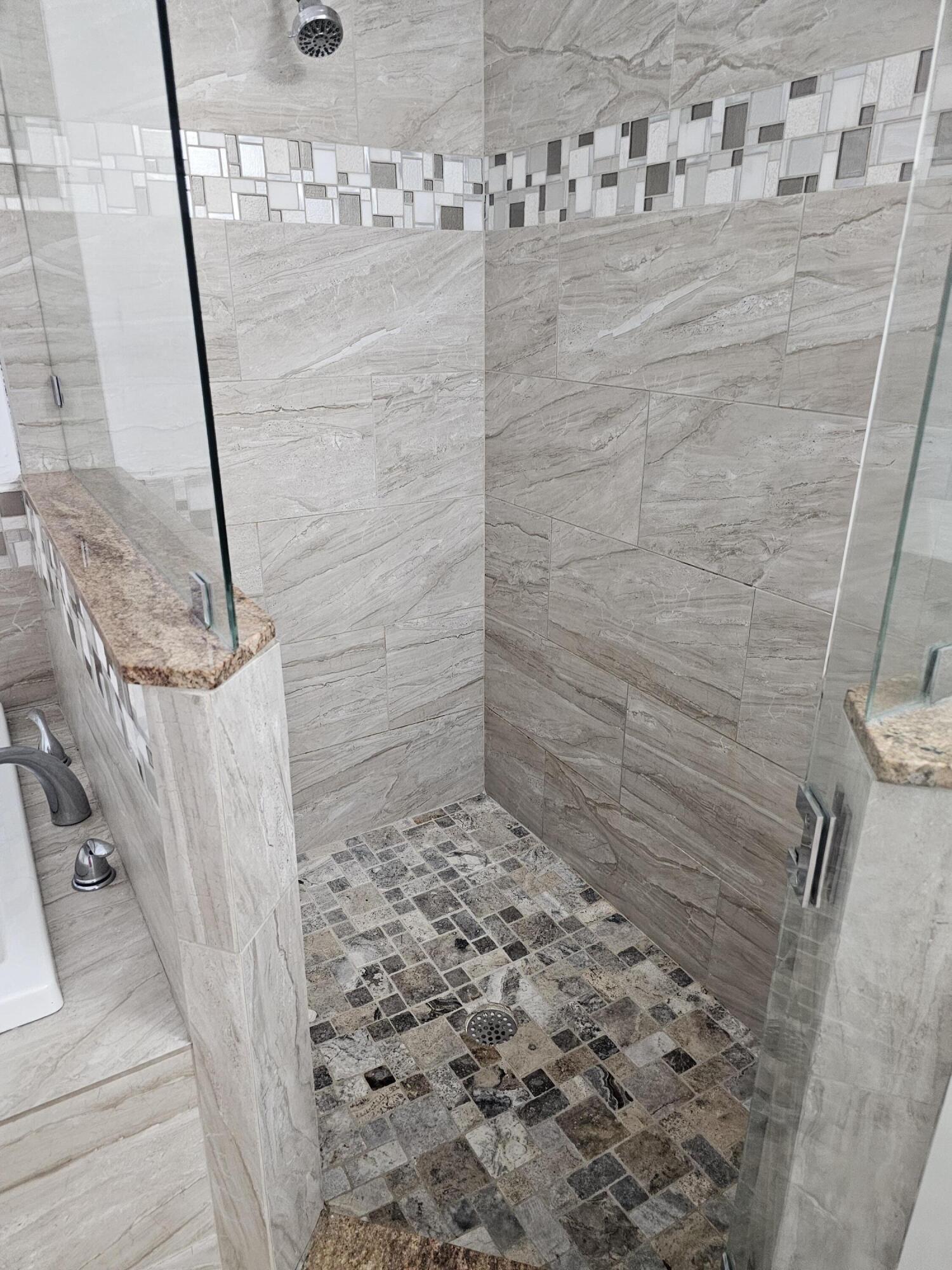 3215 Southeast Pinto Street Port St. Lucie, FL 34984 - Photo 17 of 34 a bathroom with a shower