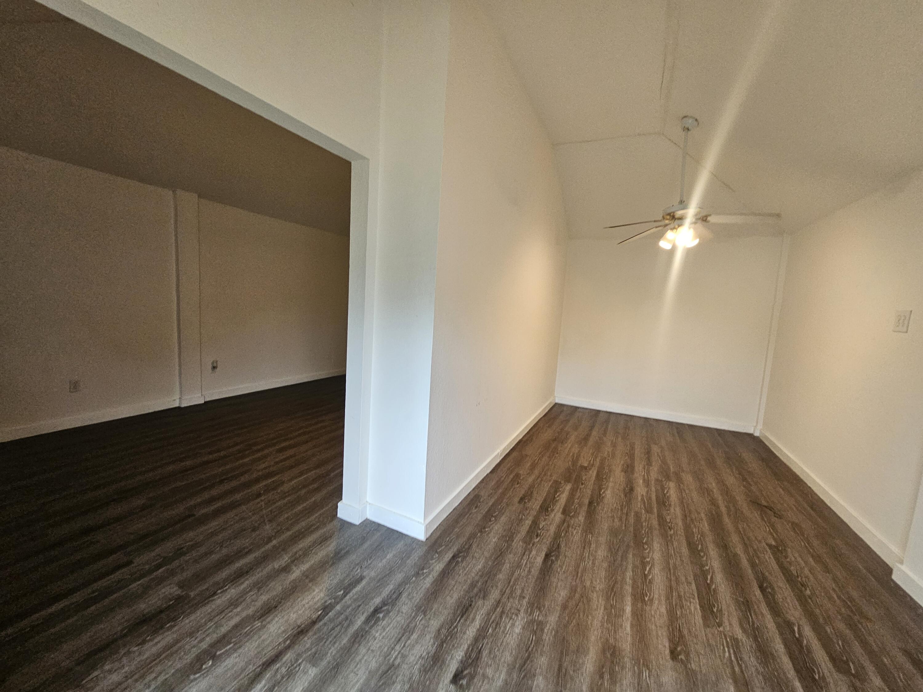 3215 Southeast Pinto Street Port St. Lucie, FL 34984 - Photo 30 of 34 a view of a room with wooden floor