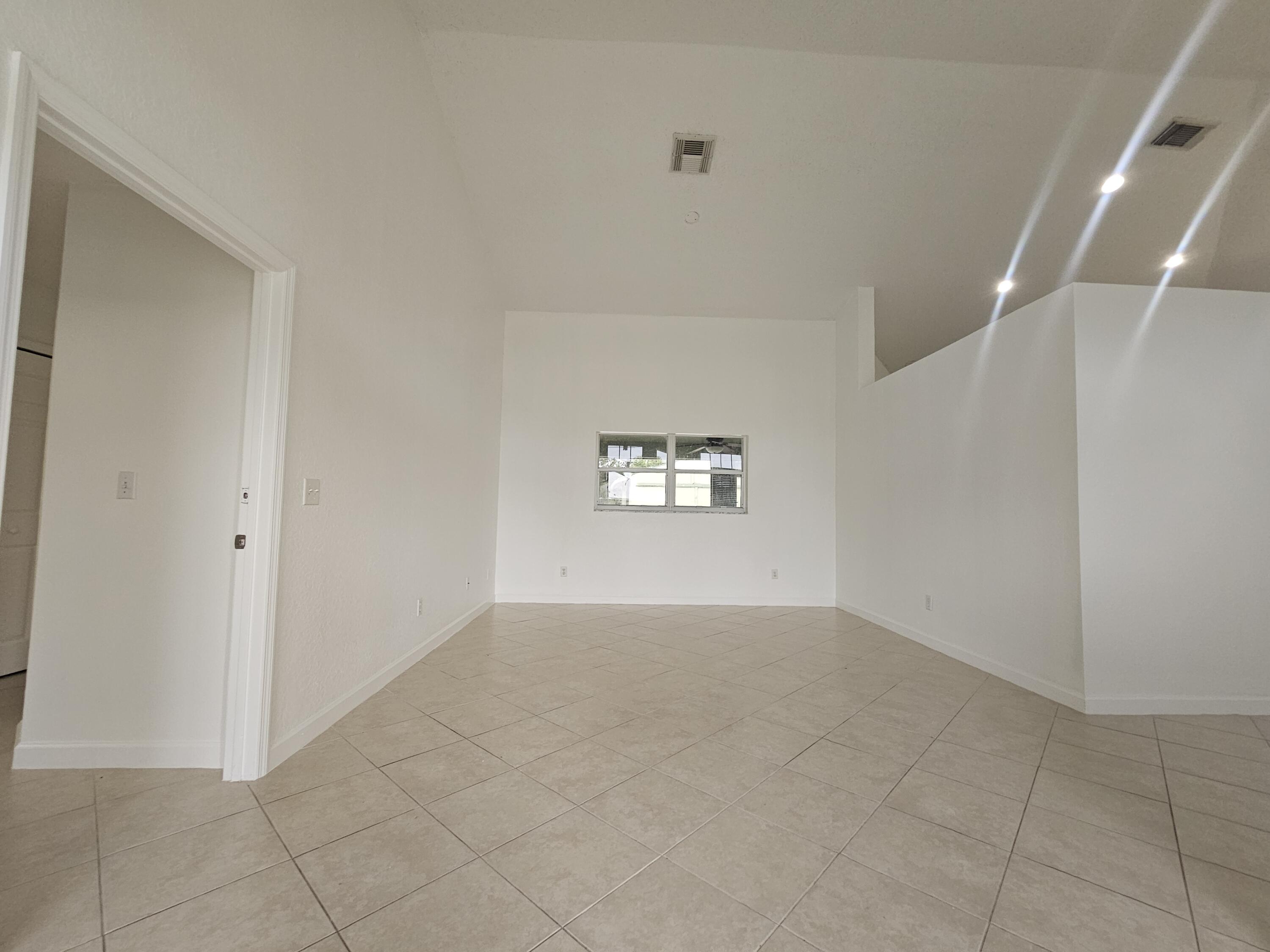 3215 Southeast Pinto Street Port St. Lucie, FL 34984 - Photo 5 of 34 a view of an empty room