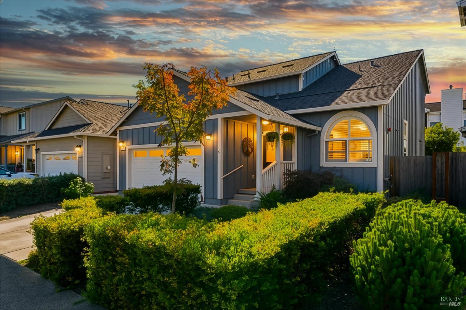 a front view of a house with garden