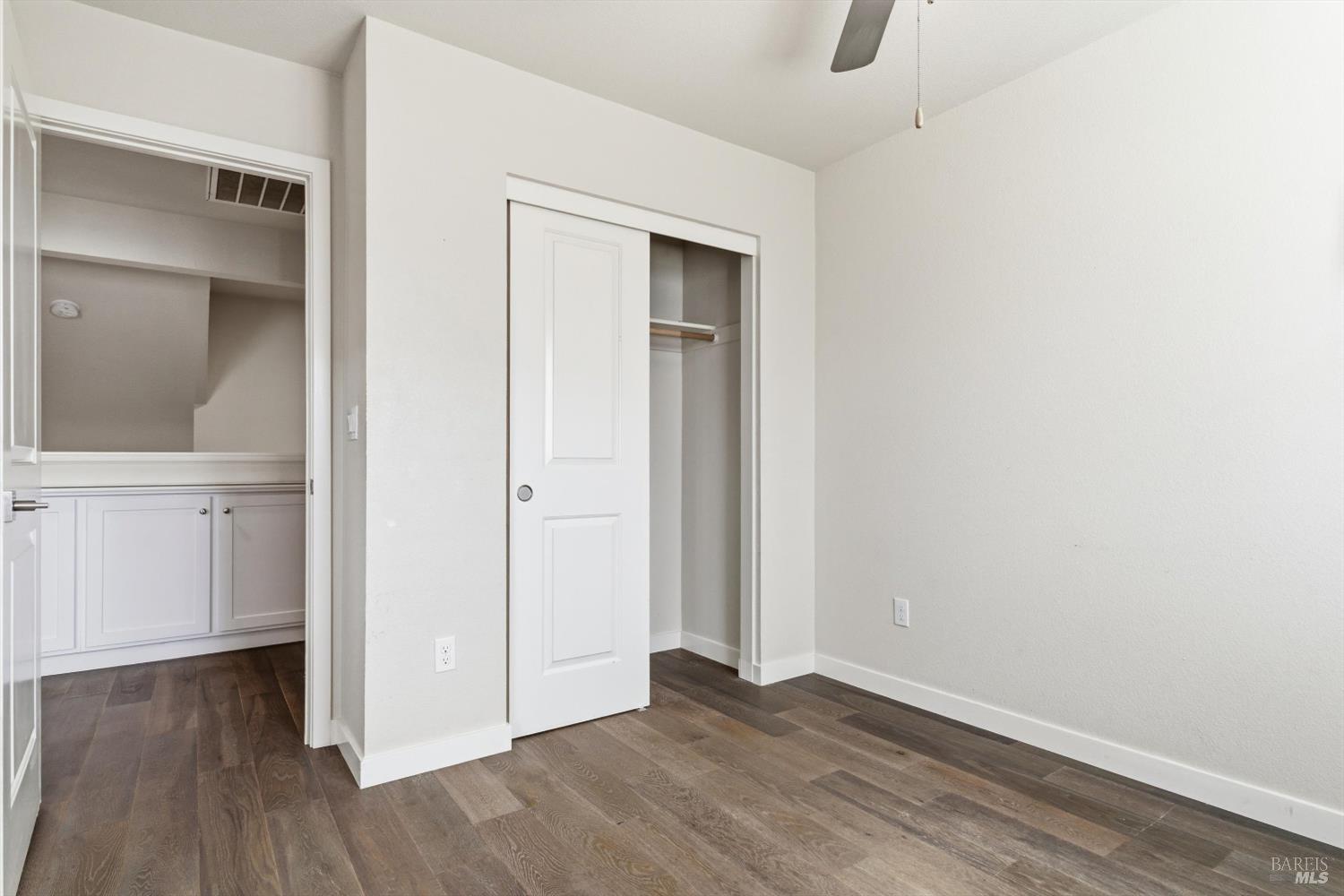 3769 Mocha Lane Santa Rosa, CA 95403 - Photo 20 of 38 an empty room with wooden floor and closet