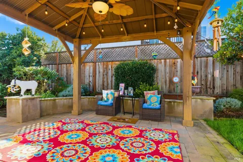 a view of store with an outdoor seating