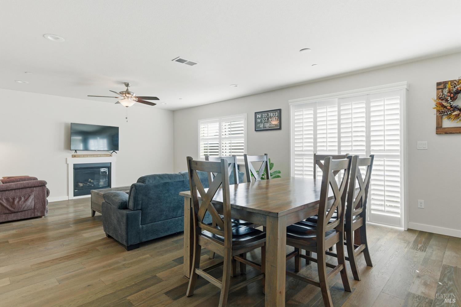 3769 Mocha Lane Santa Rosa, CA 95403 - Photo 6 of 38 a view of a dining room with furniture window and wooden floor