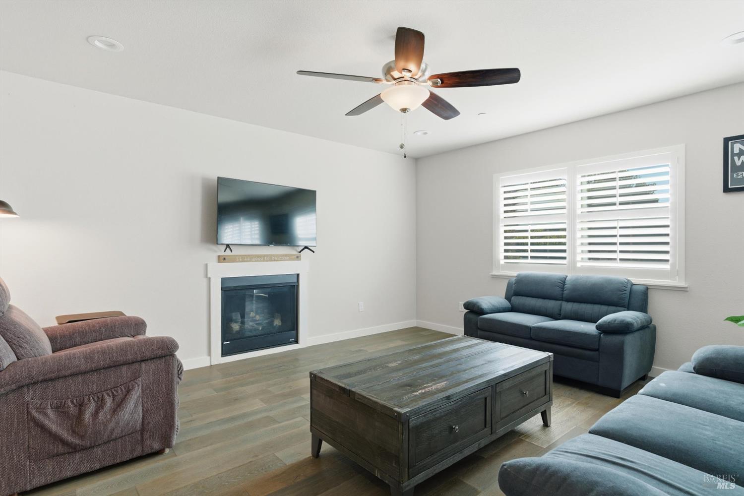 3769 Mocha Lane Santa Rosa, CA 95403 - Photo 8 of 38 a living room with furniture and a fireplace