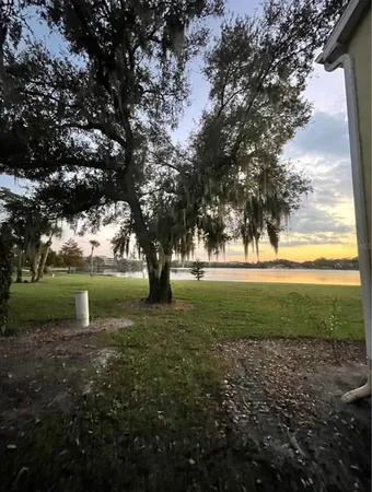 a view of a lake from a yard
