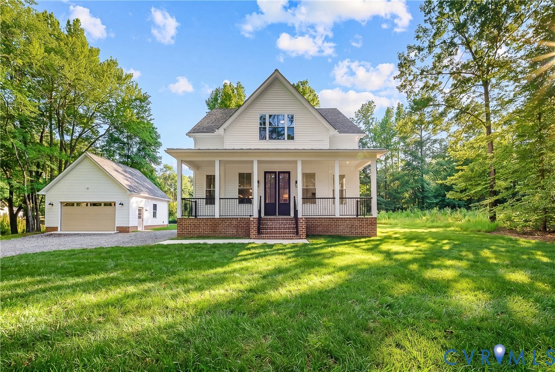 8299 Pamlico Road Ashland, VA 23005 - Photo 3 of 35 a view of a house with a yard and sitting area