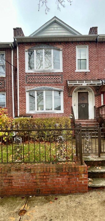 1114 Bay Ridge Parkway Brooklyn, NY 11228 - Photo 1 of 7 a front view of a house with a yard