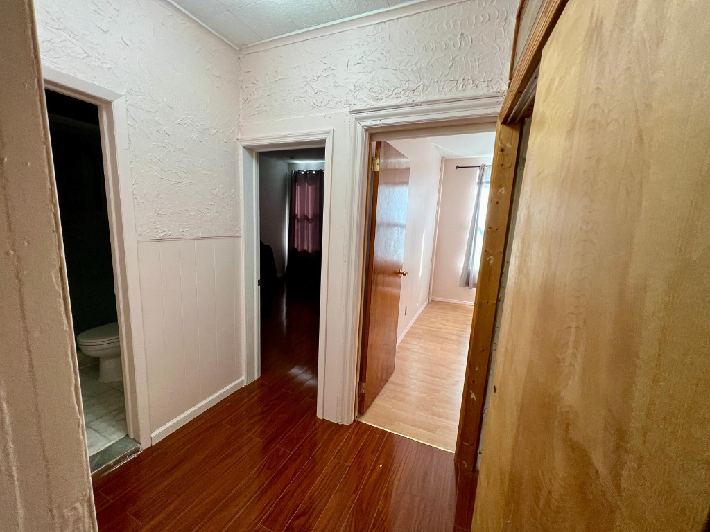 1114 Bay Ridge Parkway Brooklyn, NY 11228 - Photo 4 of 7 a view of hallway with wooden floor