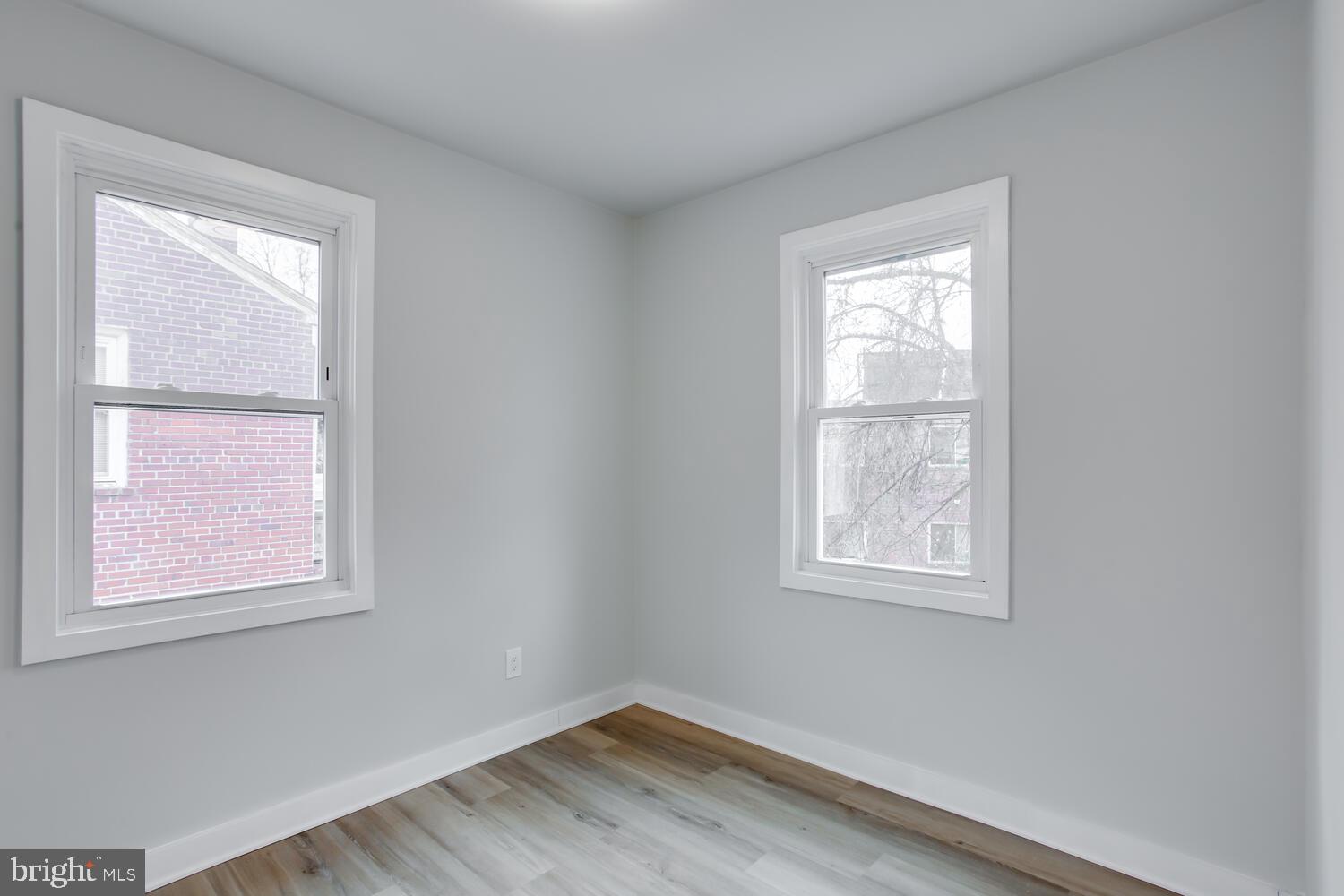 4803 Bass Place Southeast Washington, DC 20019 - Photo 15 of 22 an empty room with a window