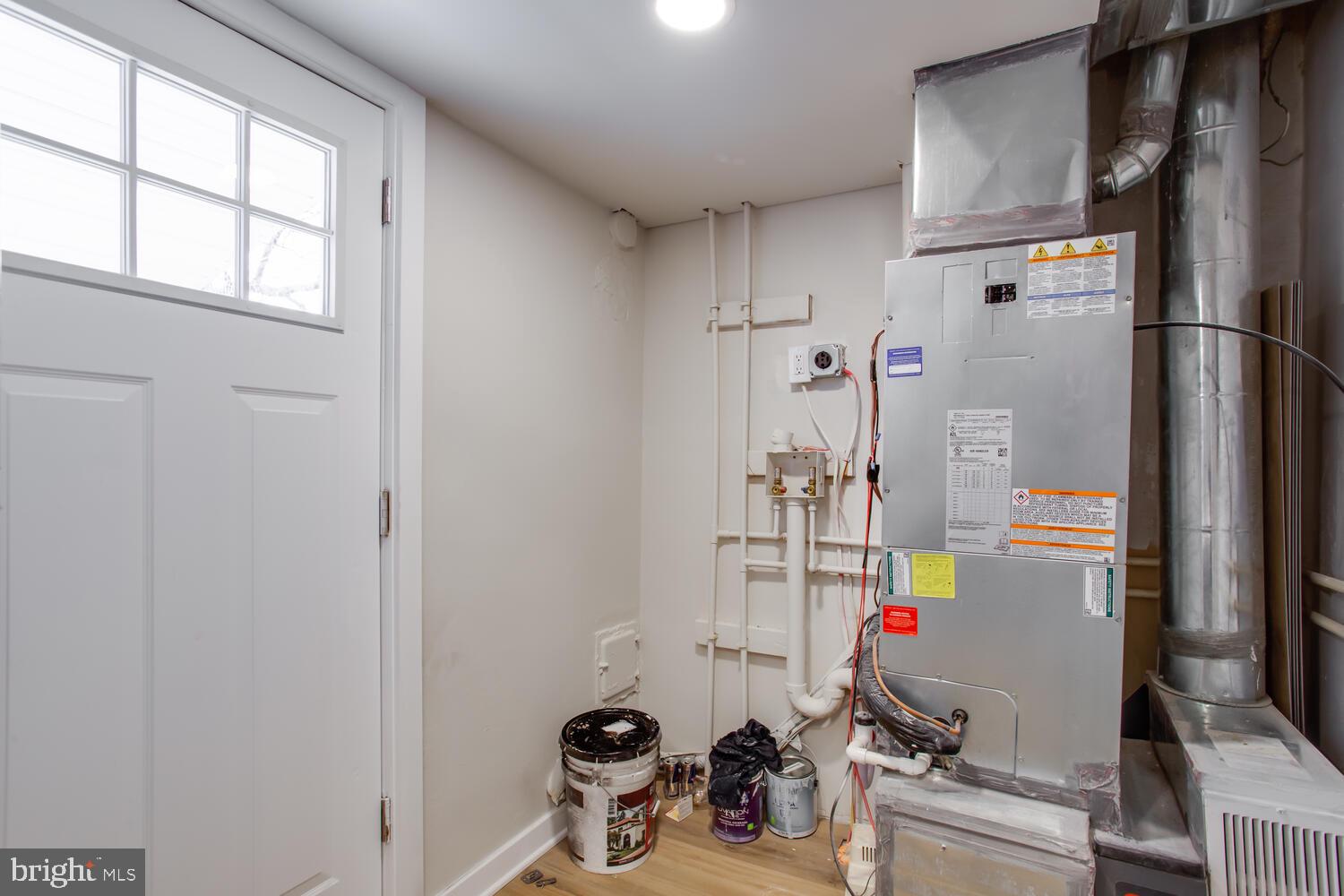 4803 Bass Place Southeast Washington, DC 20019 - Photo 18 of 22 a room with storage and utility