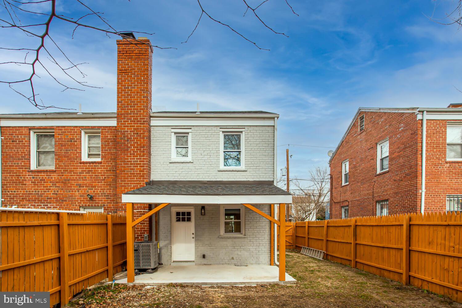 4803 Bass Place Southeast Washington, DC 20019 - Photo 21 of 22 a front view of a house with large windows