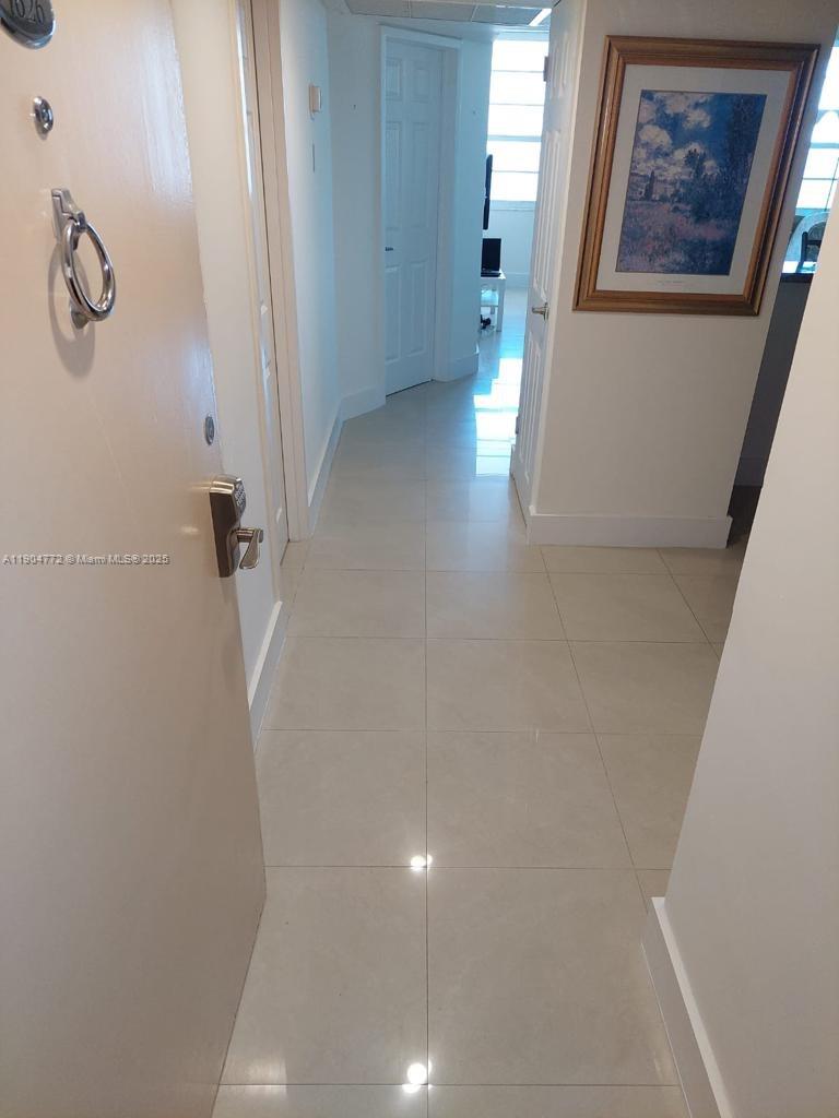 100 Lincoln Road, Unit 1626 Miami Beach, FL 33139 - Photo 13 of 43 a view of a hallway with interior of the house