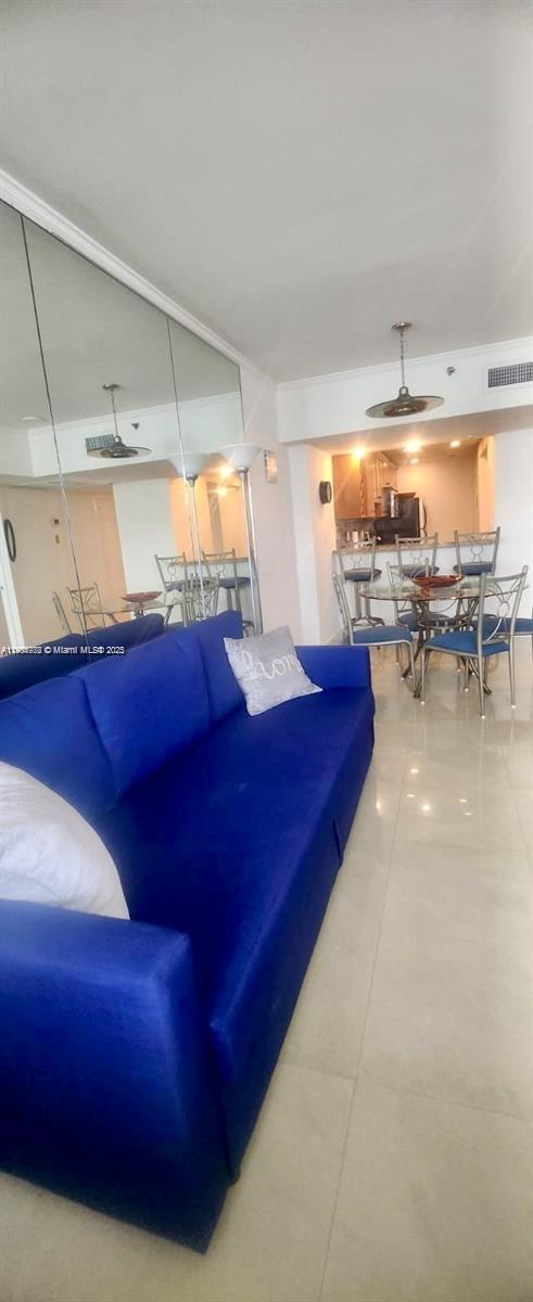 100 Lincoln Road, Unit 1626 Miami Beach, FL 33139 - Photo 17 of 43 a living room with furniture and a large window