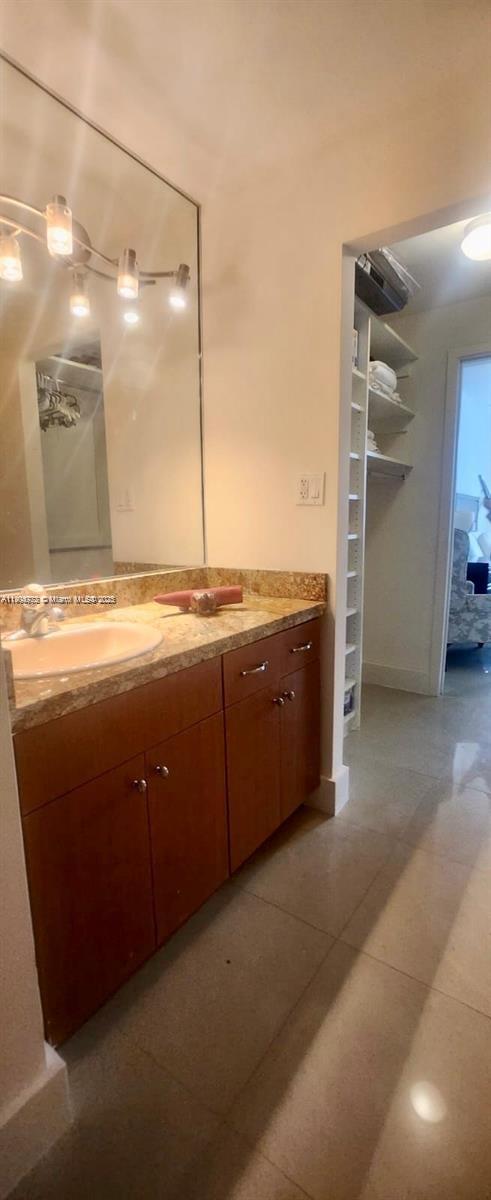100 Lincoln Road, Unit 1626 Miami Beach, FL 33139 - Photo 25 of 43 a bathroom with a sink double vanity and a mirror