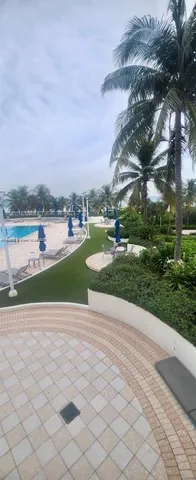 a view of a lake with a yard