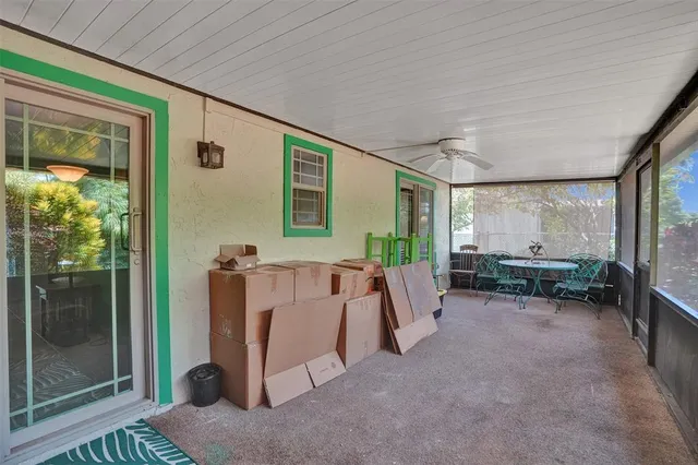 a view of a street with a flower garden