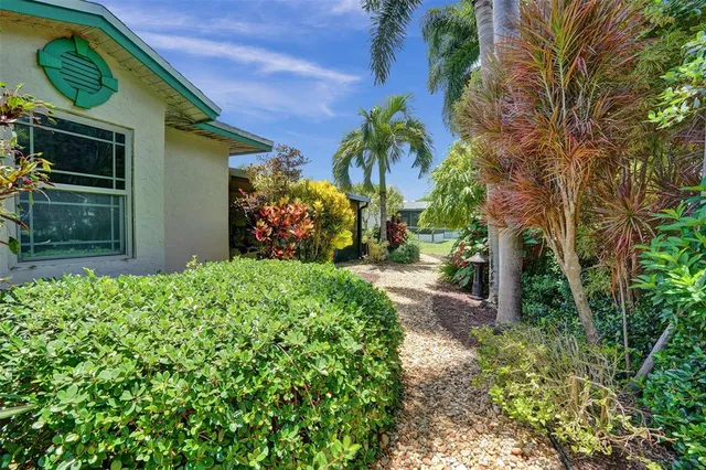 a backyard of a house with lots of green space