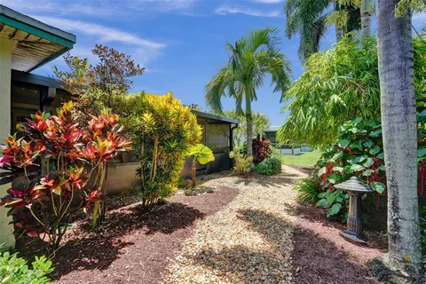 a backyard of a house with lots of green space