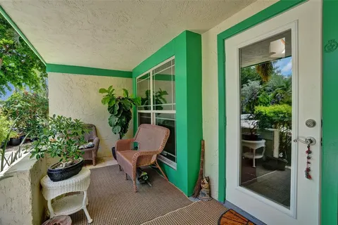 a view of a terrace with a garden