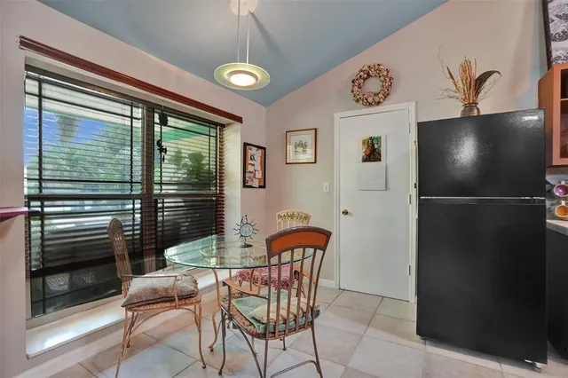 a kitchen with stainless steel appliances granite countertop a stove and cabinets