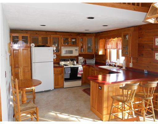397 Bald Mountain Road Oquossoc, ME 04964 - Photo 4 of 22 Kitchen.