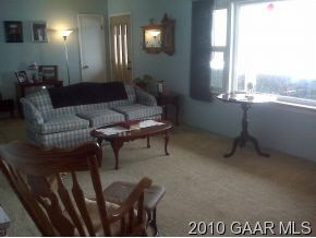 3610 Rockfish Road Grottoes, VA 24441 - Photo 2 of 9 a living room with furniture and a window
