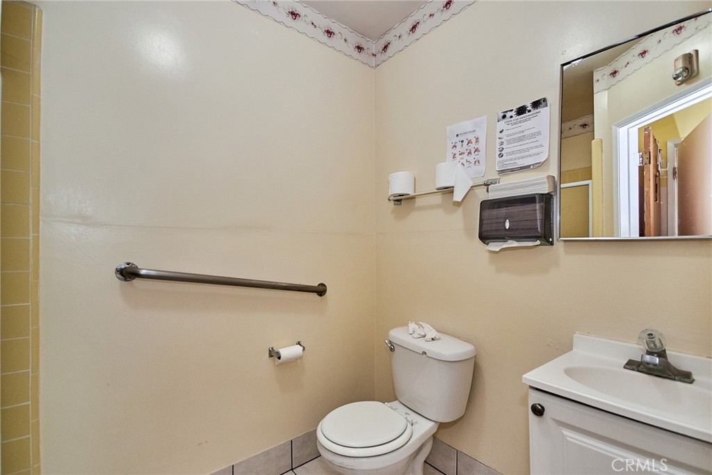 528 Howard Street Alhambra, CA 91801 - Photo 19 of 37 a white toilet sitting next to a bathroom sink