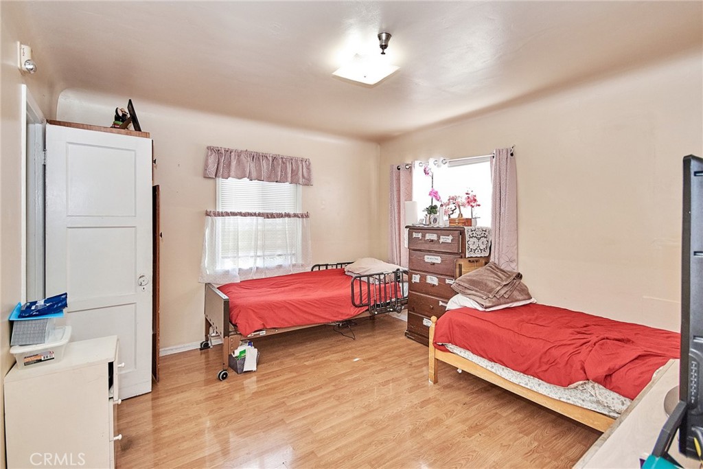 528 Howard Street Alhambra, CA 91801 - Photo 34 of 37 a bedroom with a bed and a window