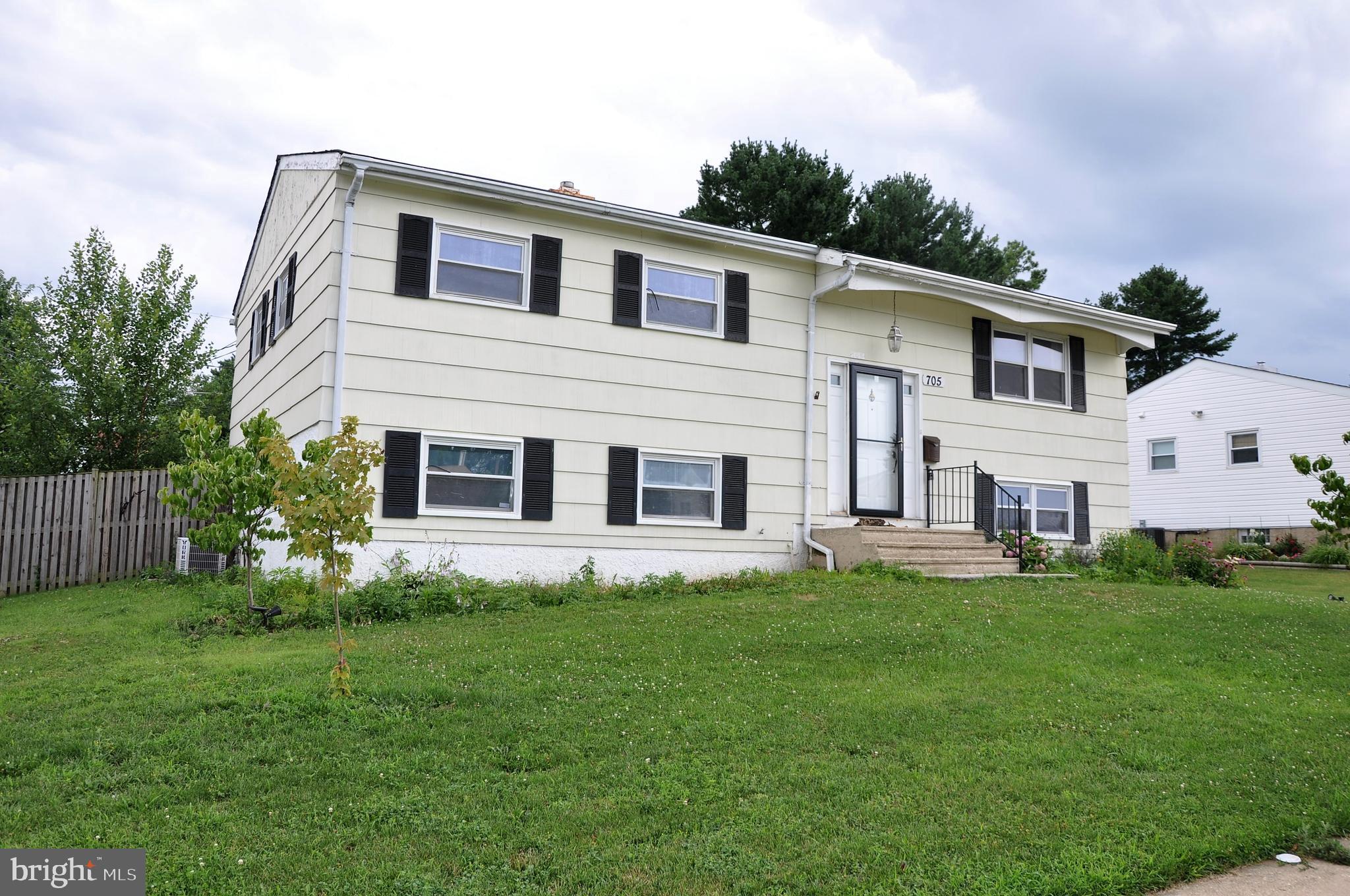 705 Crosby Road Baltimore, MD 21228 - Photo 2 of 37 a house view with a garden space