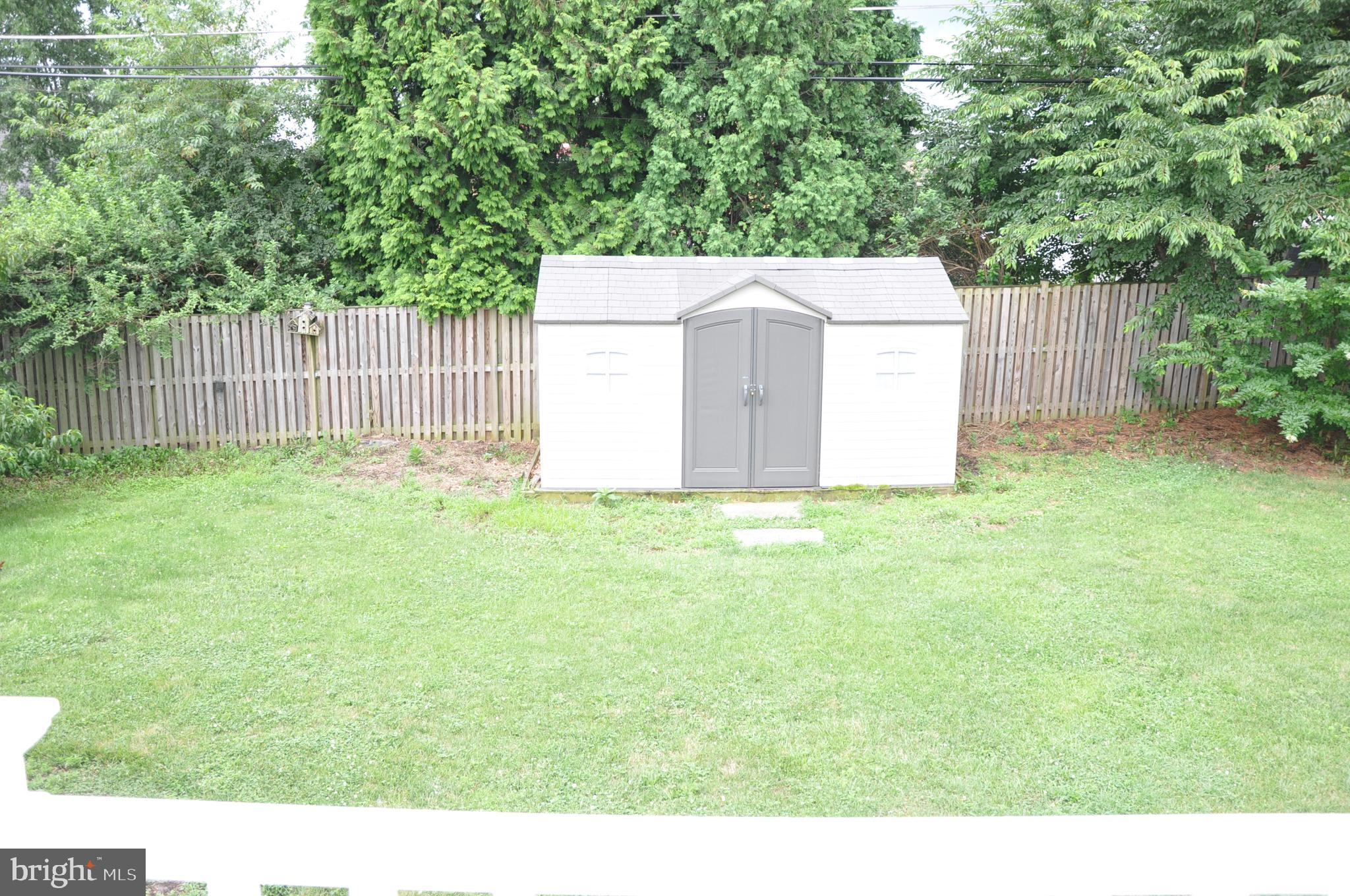 705 Crosby Road Baltimore, MD 21228 - Photo 23 of 37 a view of a backyard