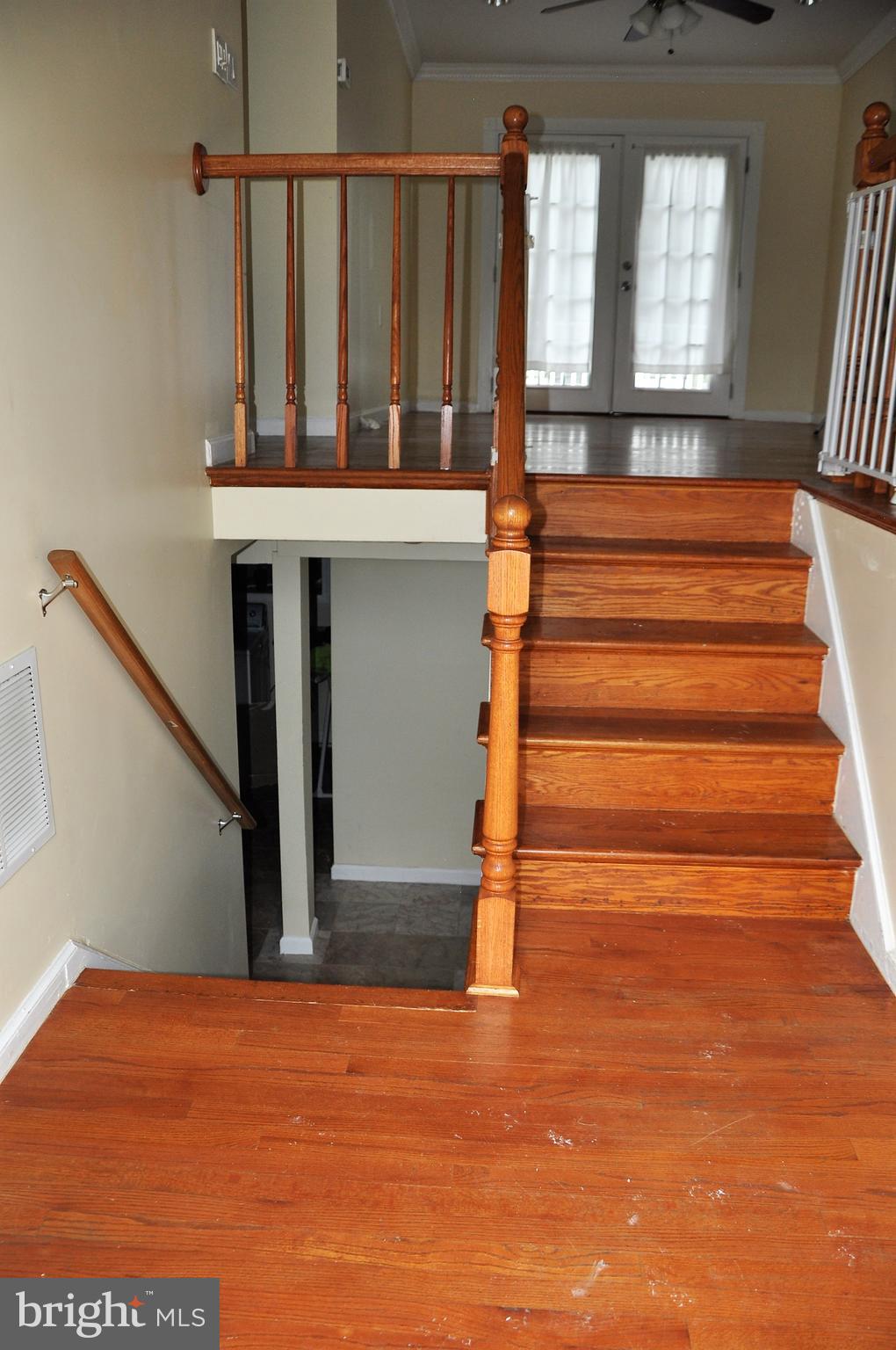 705 Crosby Road Baltimore, MD 21228 - Photo 27 of 37 a view of entryway and hall with wooden floor