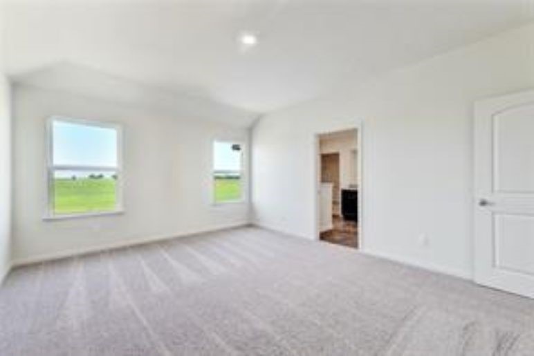 14101 Prospector Way Elgin, TX 78621 - Photo 5 of 9 a view of an empty room with a window