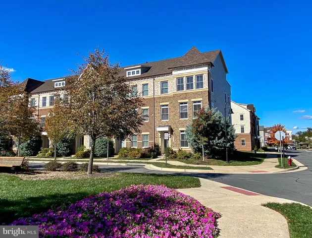 a front view of a building with street view