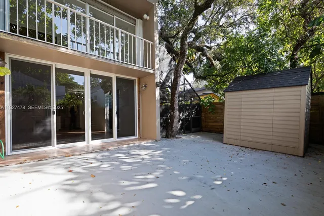 a view of a yard with an umbrella