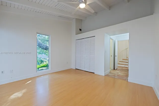 a bathroom with a toilet and a bath tub