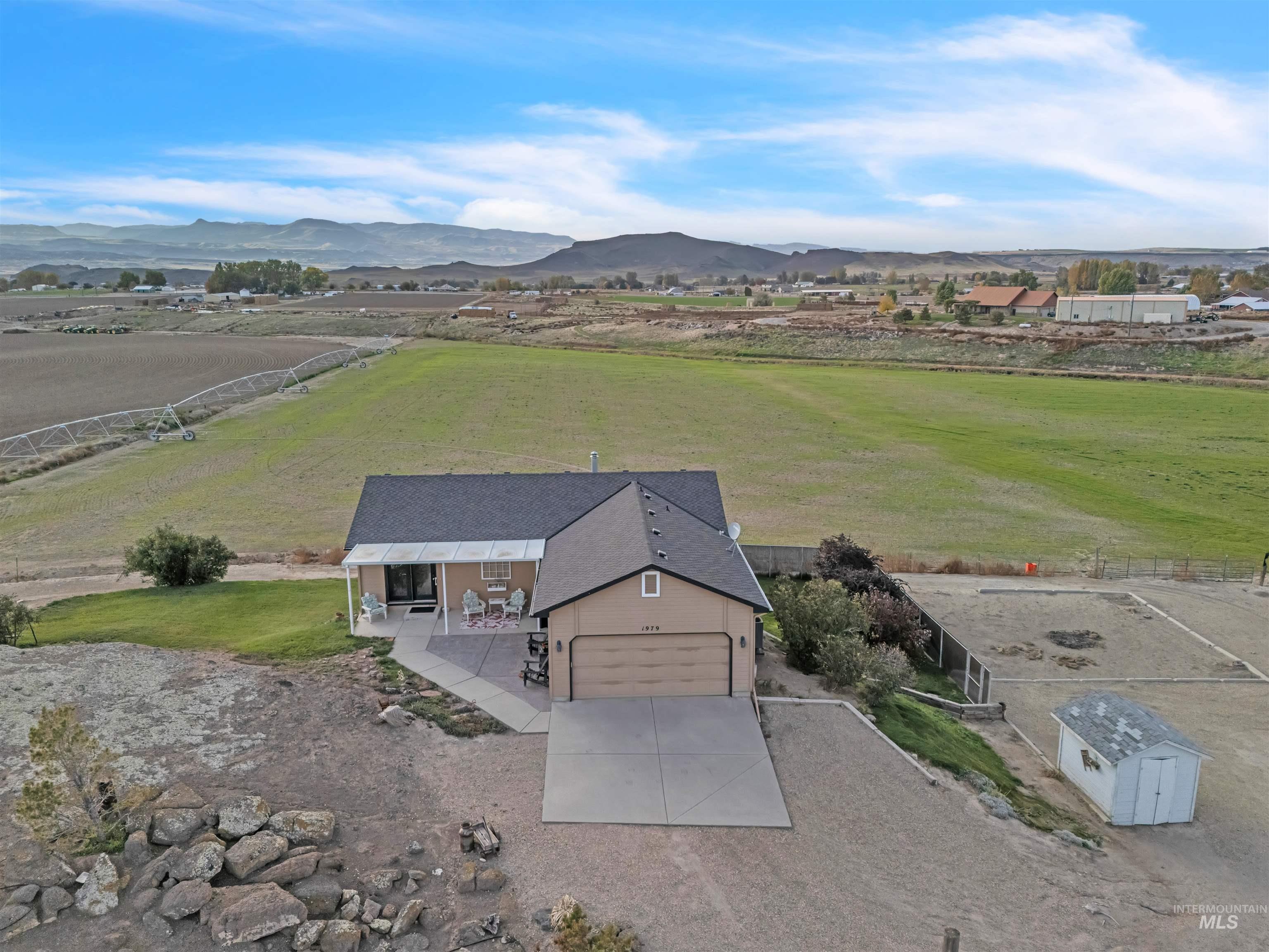 1979 South Can Ada Road Melba, ID 83641 - Photo 3 of 33 Overview of rural landscape with a mountainous background