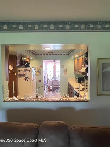 a view of a living room with furniture