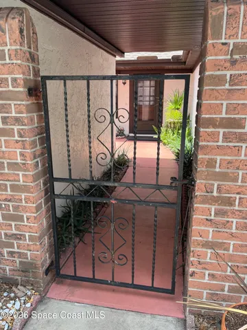 a view of entryway with a front door