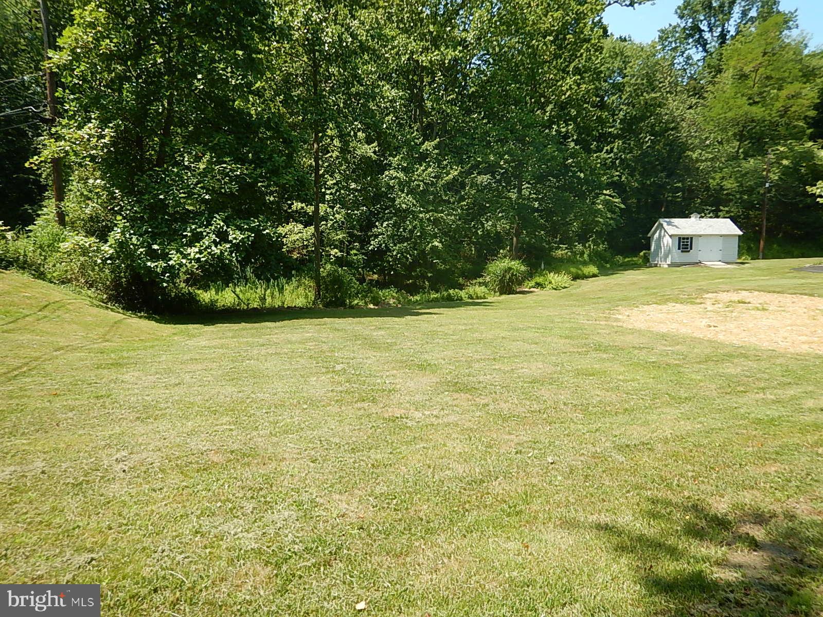 11920 Jericho Road Kingsville, MD 21087 - Photo 10 of 40 Side yard and storage shed