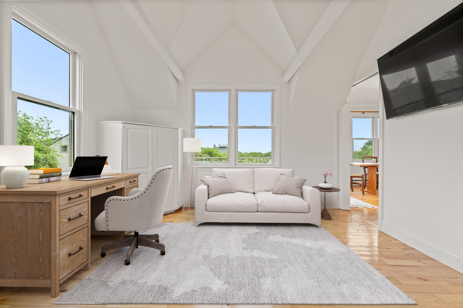 4 Berkley Street Nantucket, MA 02554 - Photo 29 of 47 a living room with furniture a flat screen tv and a window