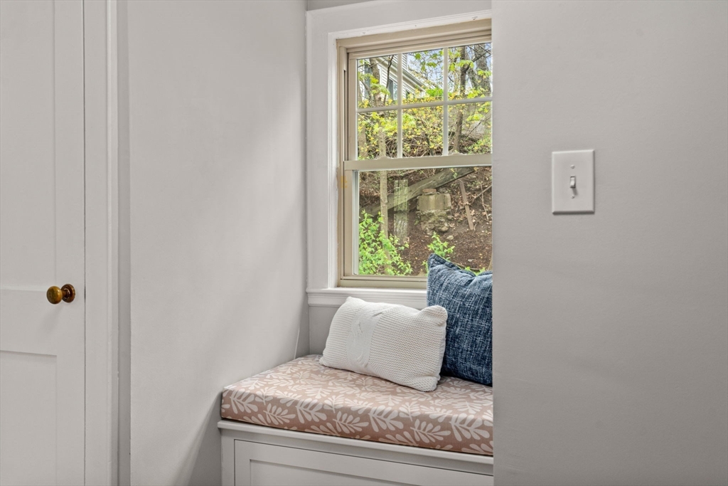 31 Northbourne Road Boston, MA 02130 - Photo 14 of 34 a living room with furniture and a window