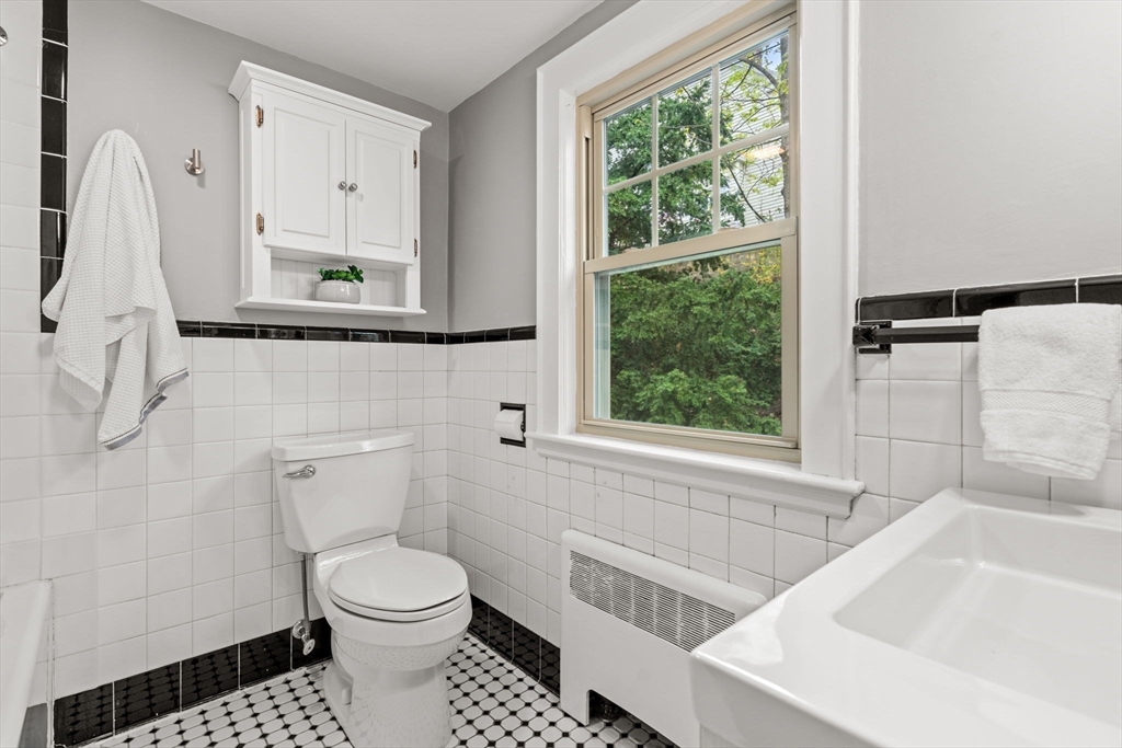 31 Northbourne Road Boston, MA 02130 - Photo 17 of 34 a bathroom with a sink toilet and shower