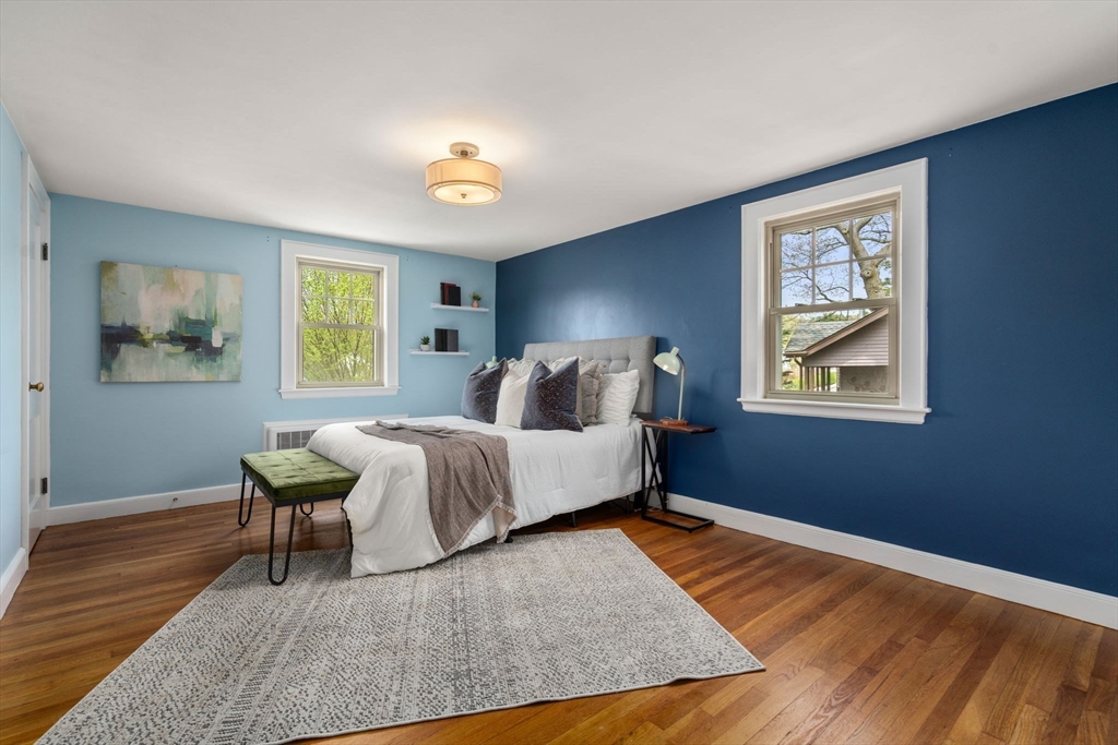 31 Northbourne Road Boston, MA 02130 - Photo 18 of 34 a bedroom with a bed and window