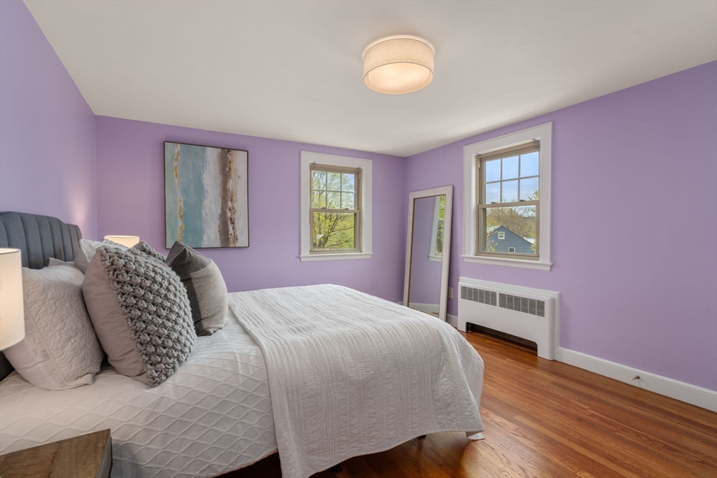 31 Northbourne Road Boston, MA 02130 - Photo 21 of 34 a bed room with a bed and a window