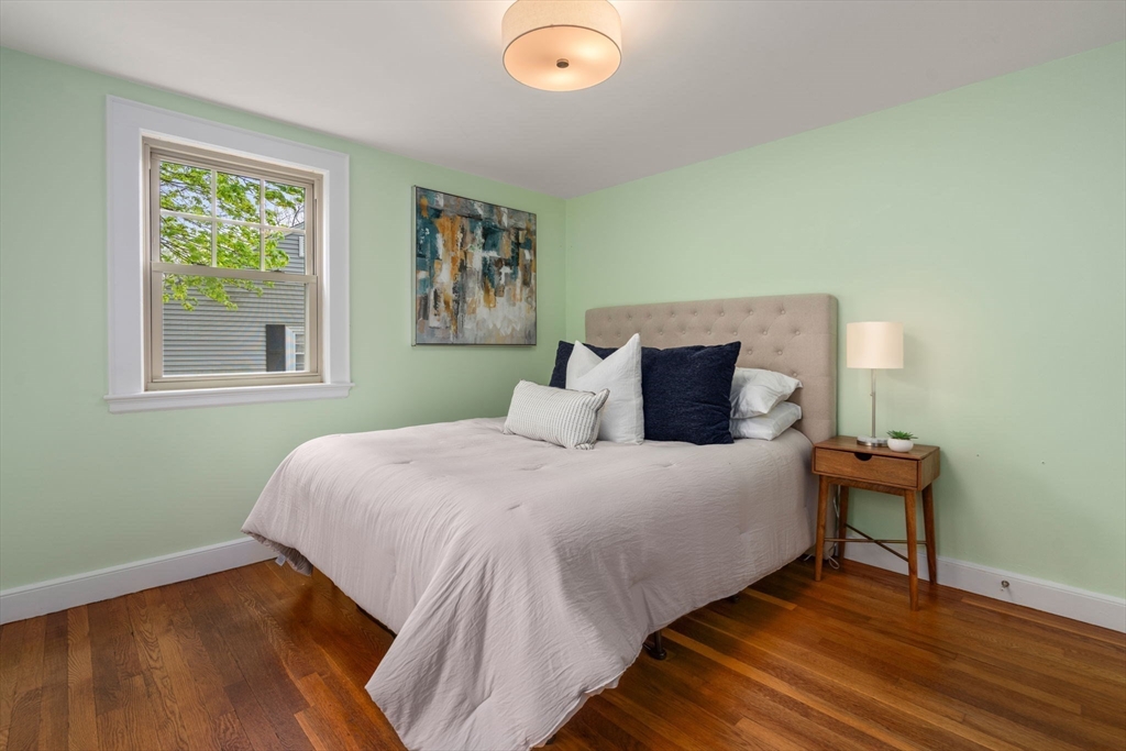 31 Northbourne Road Boston, MA 02130 - Photo 24 of 34 a bedroom with a bed and a window