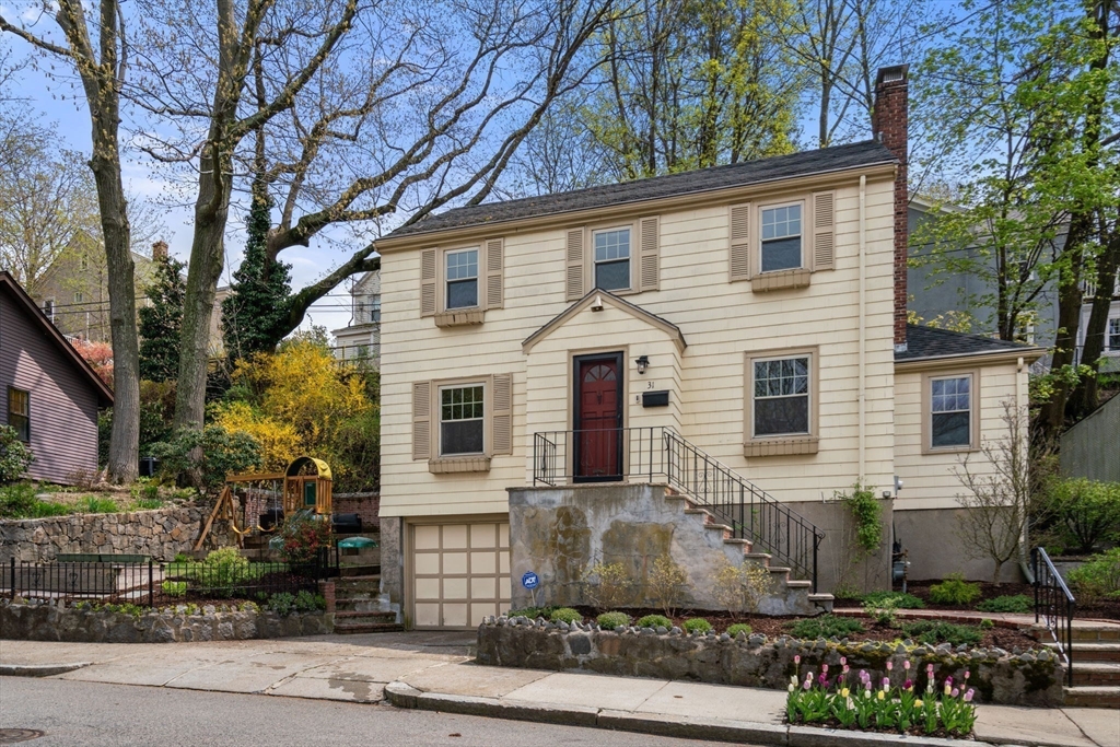 31 Northbourne Road Boston, MA 02130 - Photo 32 of 34 a view of a white house with a yard and large tree