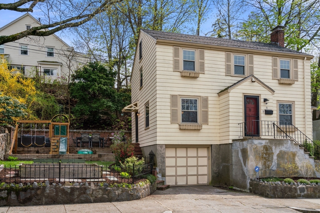 31 Northbourne Road Boston, MA 02130 - Photo 33 of 34 a front view of a house with garden