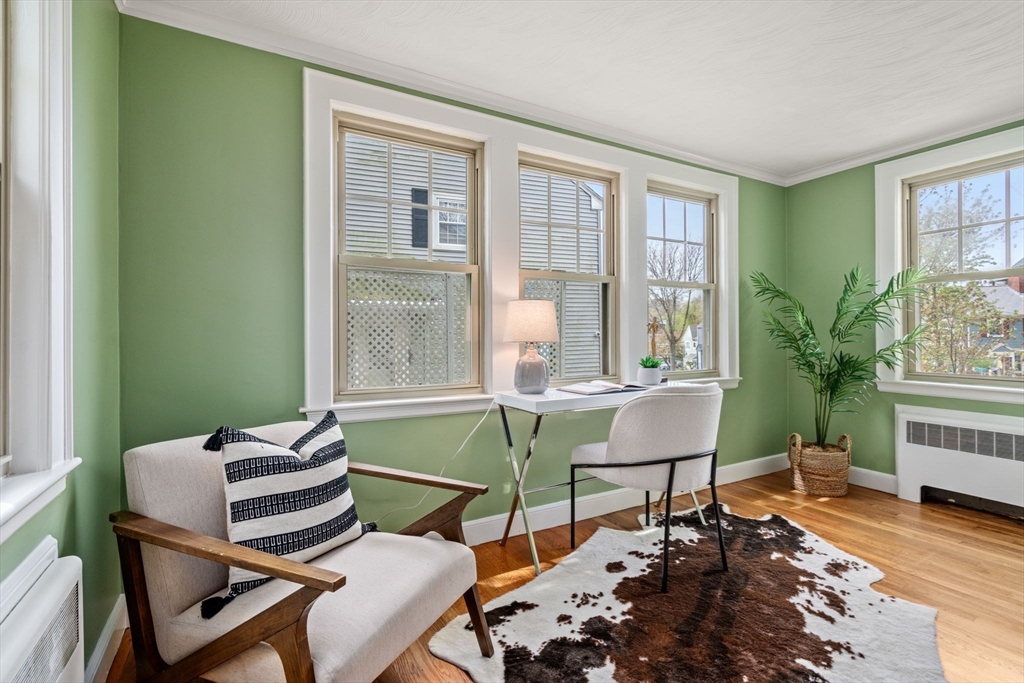 31 Northbourne Road Boston, MA 02130 - Photo 5 of 34 a room with furniture and a window