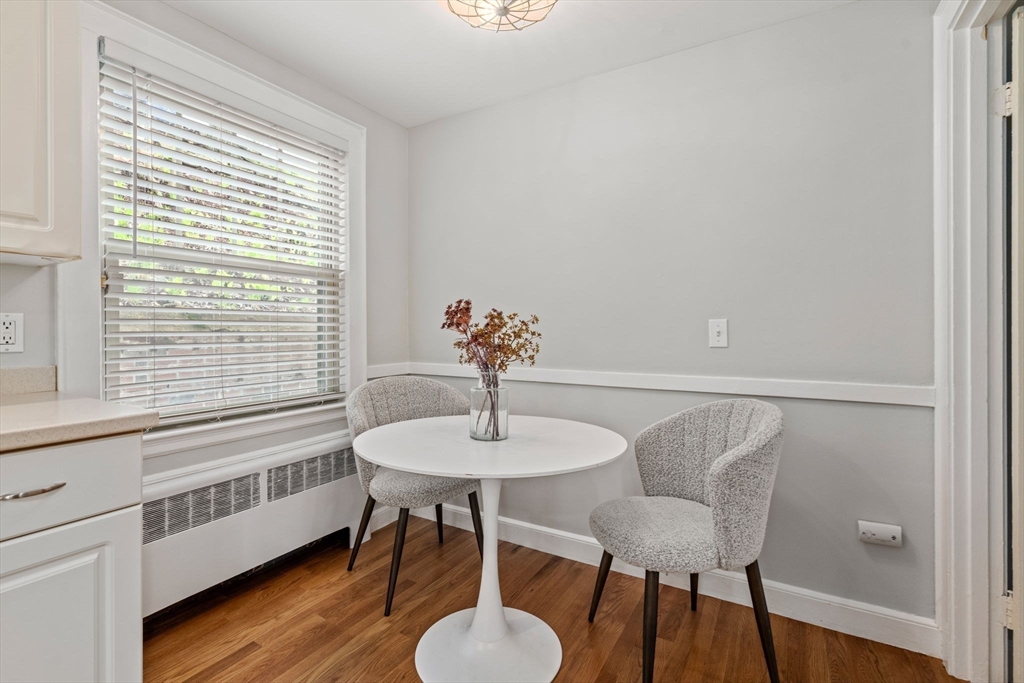 31 Northbourne Road Boston, MA 02130 - Photo 8 of 34 a view of a dining room with furniture window and wooden floor